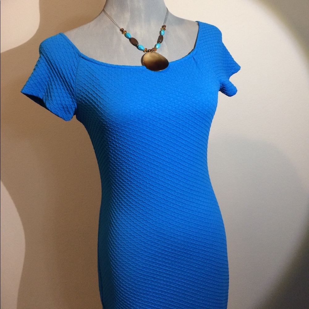 Turquoise blue body con dress by B. smart. Size S